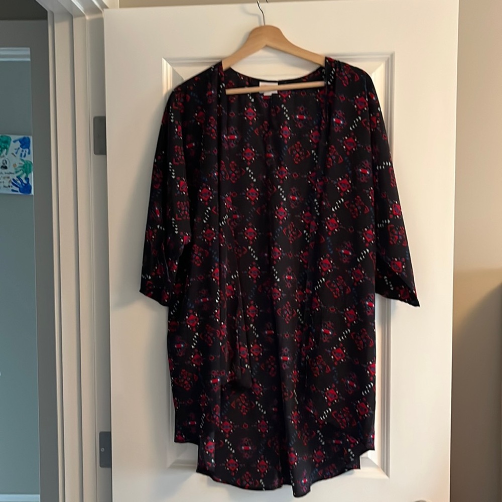 LulaRoe black and red with aztec prints never been worn!!
